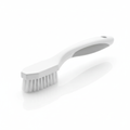 Narrow grout and gap detail cleaning brush on white background