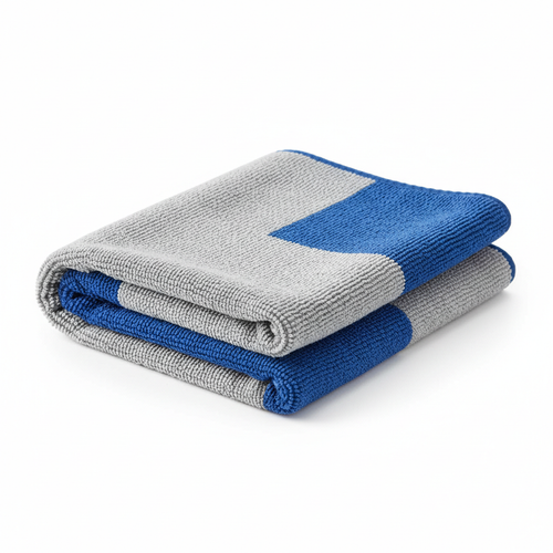 Folded microfiber cleaning cloth on white background